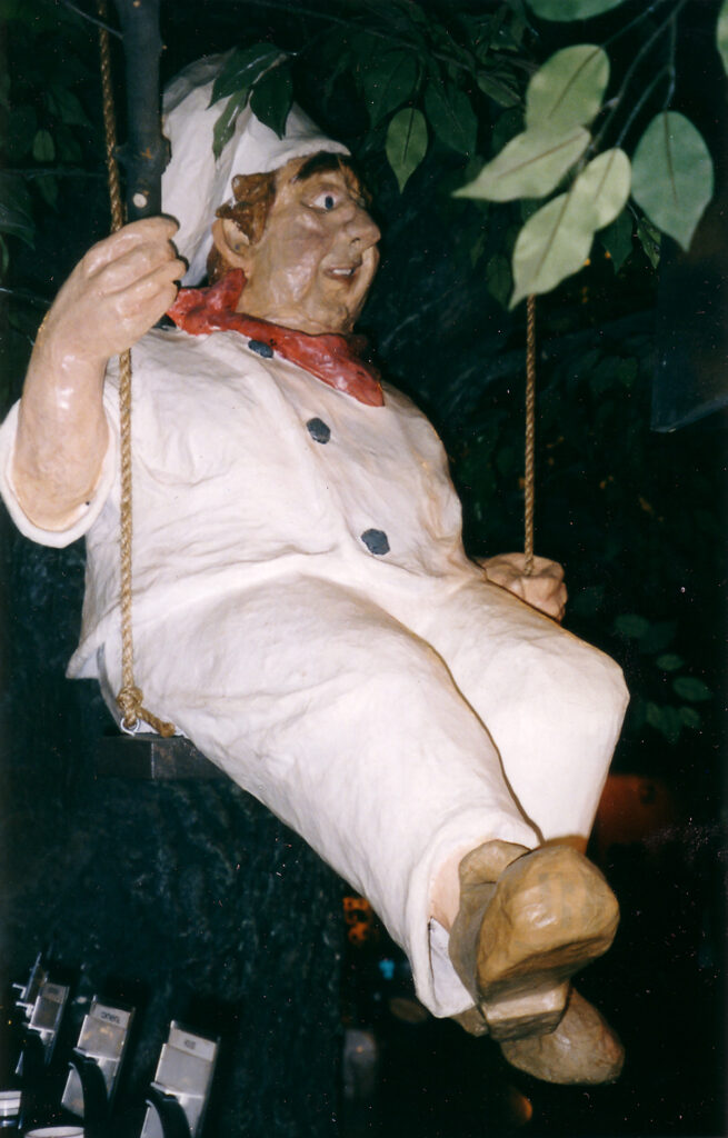 Papier-mâché baker figure created by Paul Cavilla for Nova Era Bakery