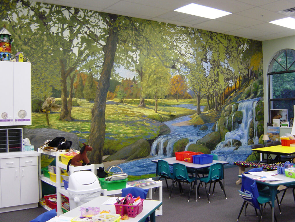 Landscape mural extending across a classroom wall at Ideal Elementary School