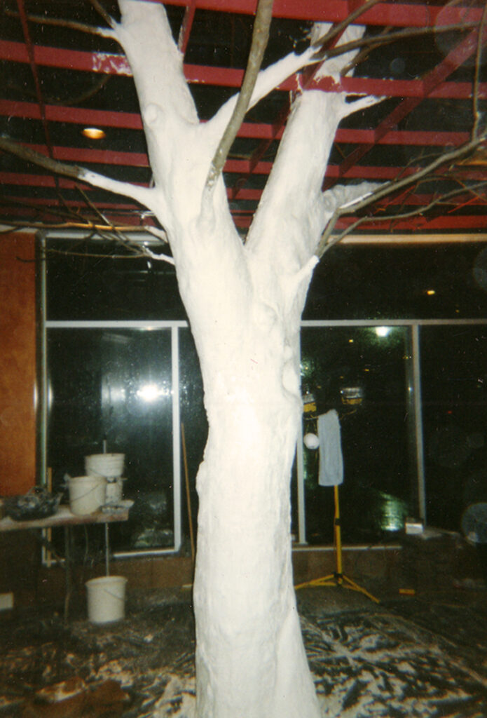 Detailed hand-modelled trunk and branches of a café tree sculpture